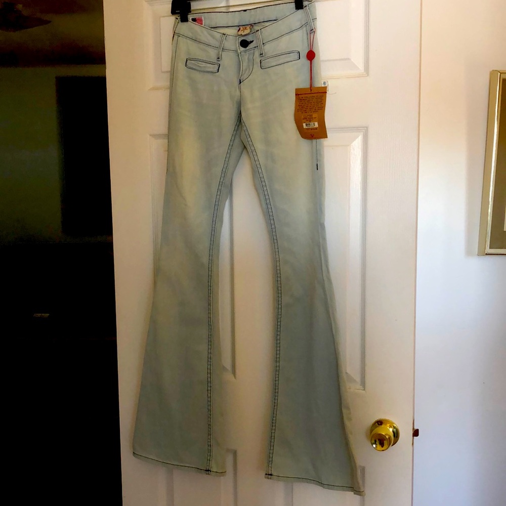 True Religion low rise, bell bottom jeans. Size 25 NWT